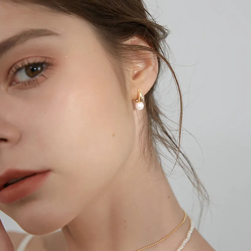 Elegant Golden Pearl Studs