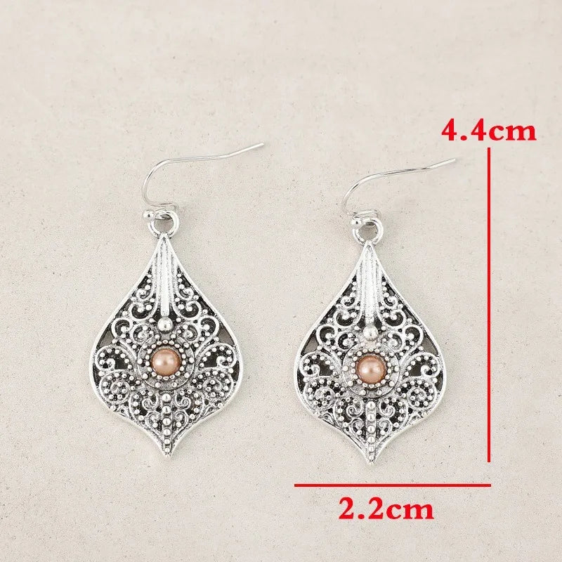 Hayden Eth | Silver Color Round Brown Stone Hook Earrings Vintage Metal Carving Hollow Spiral Pattern Dangle Earrings for Women