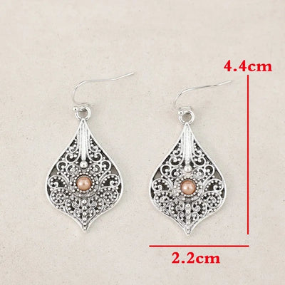 Hayden Eth | Silver Color Round Brown Stone Hook Earrings Vintage Metal Carving Hollow Spiral Pattern Dangle Earrings for Women